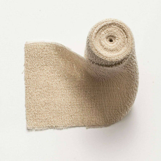 Copia di una benda in crêpe sterile da 5 cm con doppio avvolgimento - stock scaduto